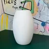 245. Vase. Mål: H: 26 cm, B: 15 cm. Pris: 499 kr.